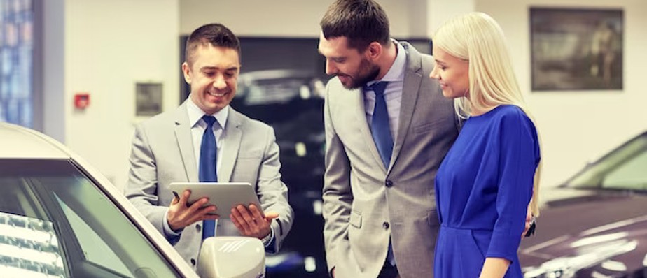 Expert staff providing guidance at a Thane multi car showroom